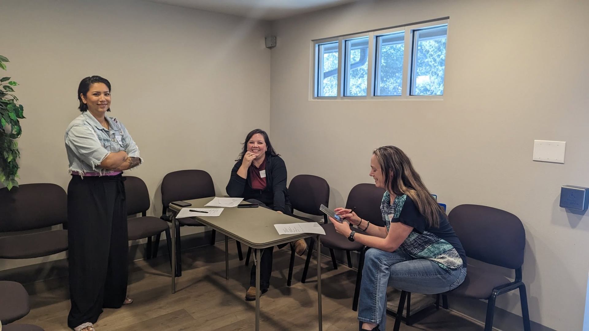 A community group session in a bright meeting room